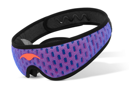 Three-quarter studio shot of the Manta PRO Sleep Mask with a blue and red mesh strap, black borders, and an coral-red Manta Sleep logo.